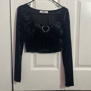 Black long sleeve cropped top.